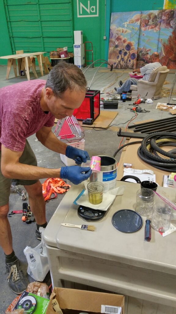 Mixing epoxy resin on a digital scale in the shop