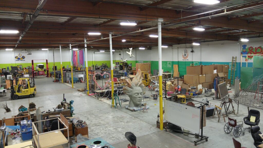 Wide view of The Generator makerspace in Reno — 34,000 square feet of art builds in progress
