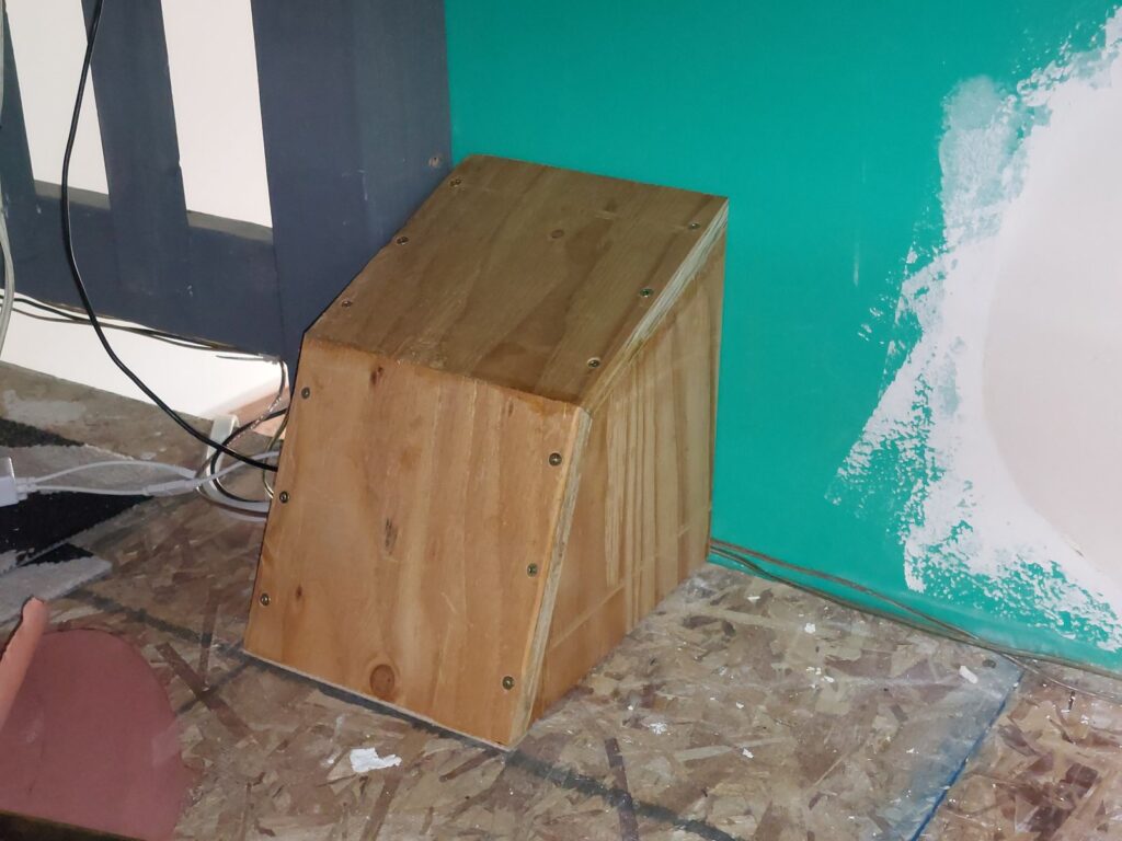 A neat plywood box built over the rerouted ducting where it runs along the corner of the floor