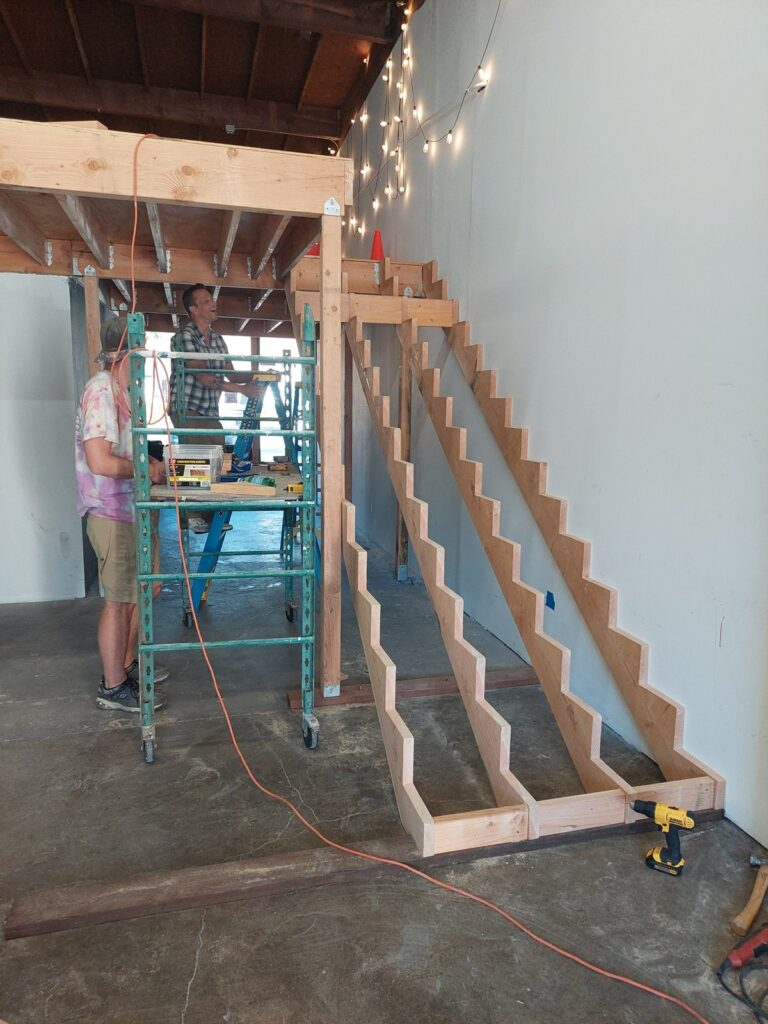 New stair stringers rising to the mezzanine at San Diego CoLab